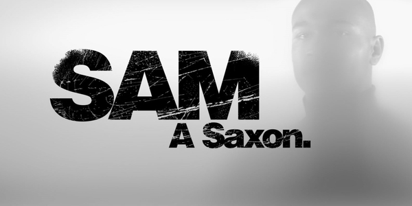 Thumbnail: "Sam a Saxon" in the background is a man behind fog looking at the camera